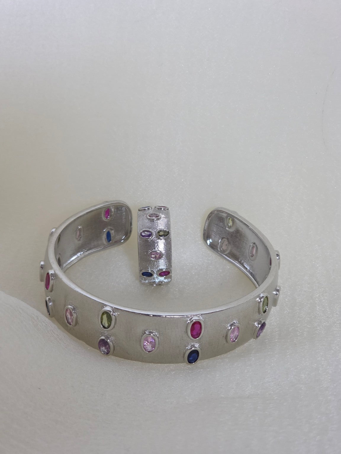 Silver-tone cuff bracelet and matching ring with multicolour stones